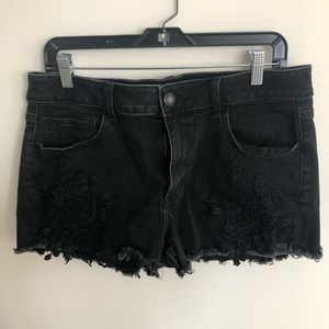 AE black jean shorts with lace detailing